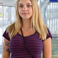 Natural busty teenager girl showing her huge breasts in public