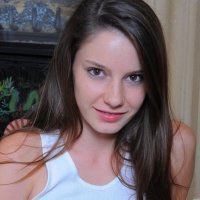 Little busty girl showing her full magnificent bare teen breasts