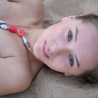 Little nudist girl on the beach
