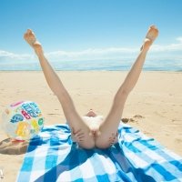 Lea a beautiful and sweet teen girl posing her nude young body at the beach